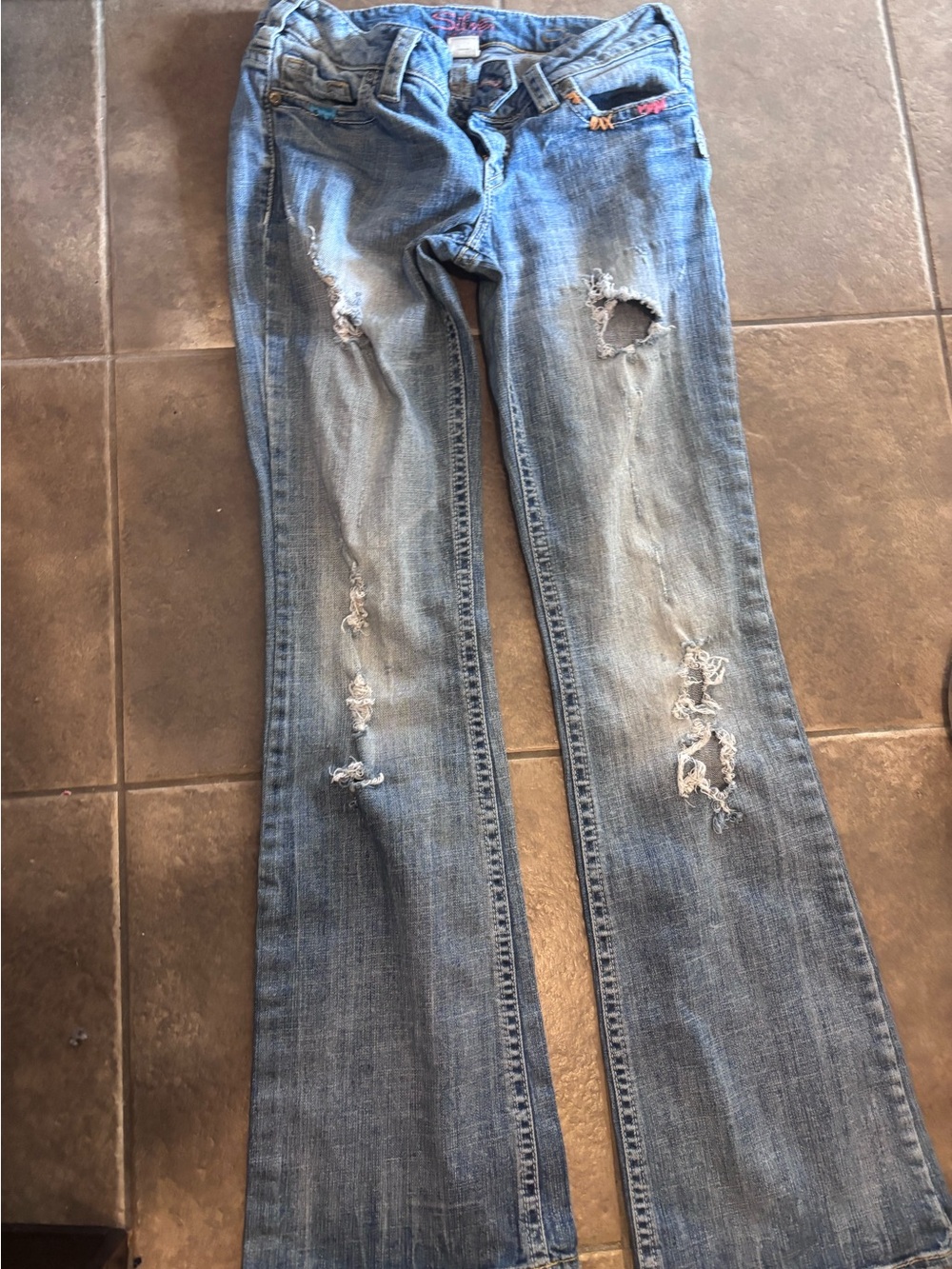 Silver Jeans Light Blue Distressed Flare Jeans